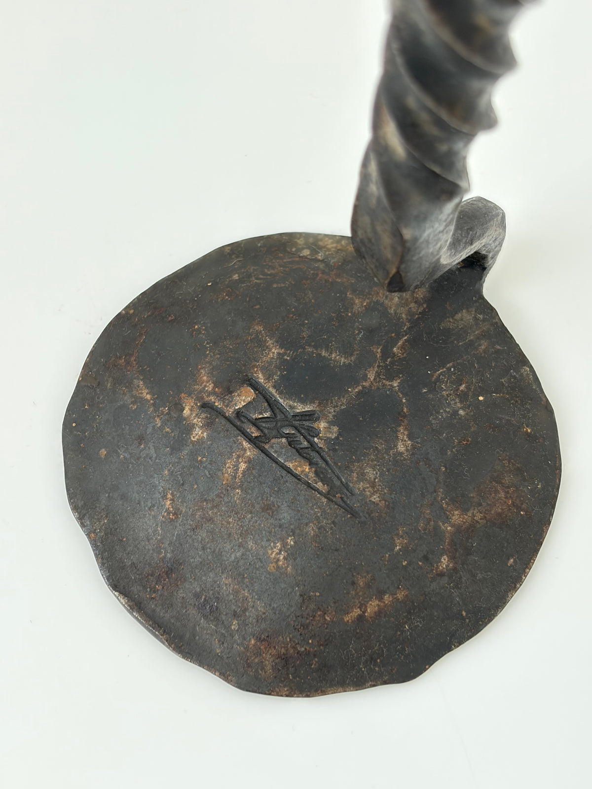 Signed Iron Candle Holder